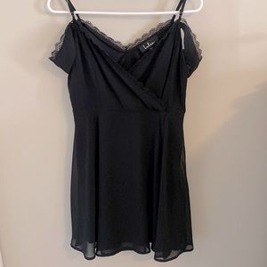 Size medium. Short black dress with off the shoulder lace straps